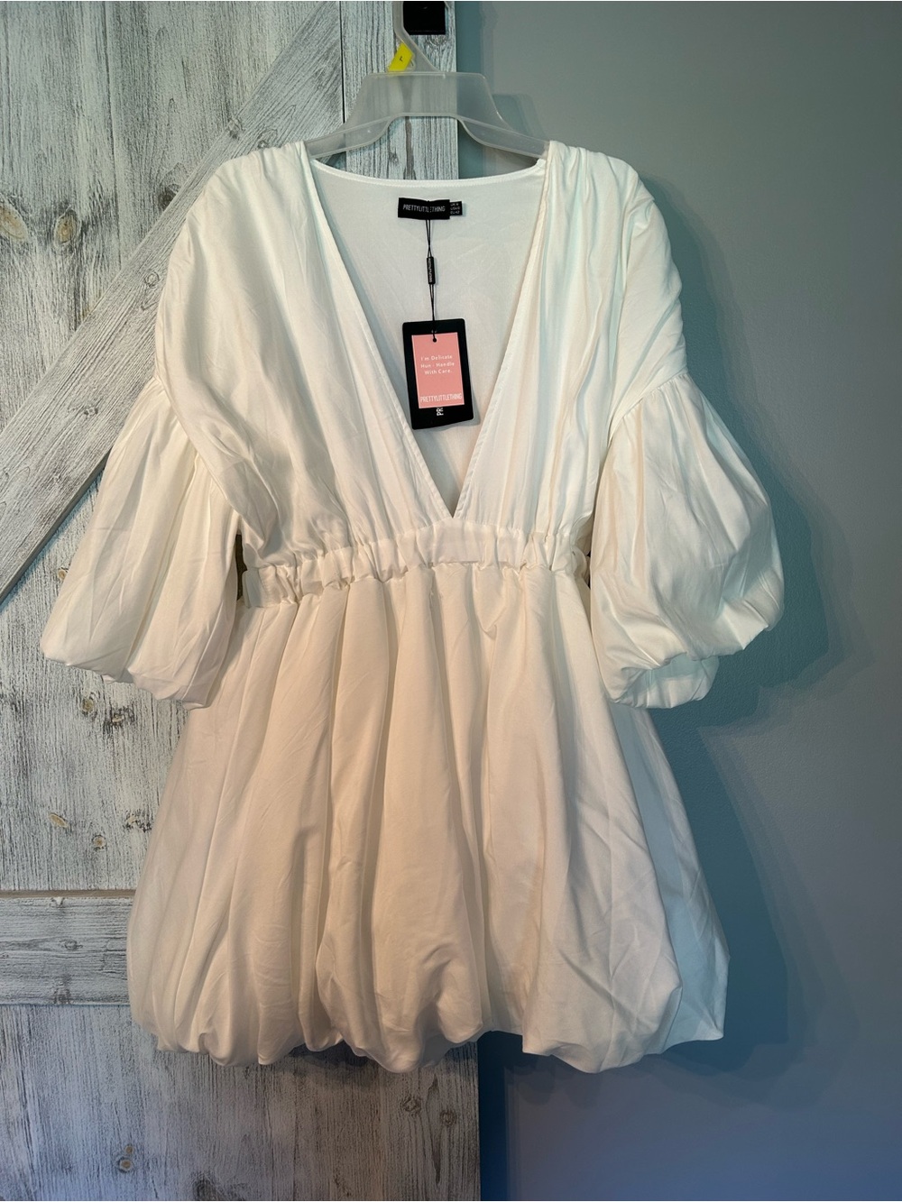 Pretty little thing white puffball hem dress US size 10 can fit a 10/12